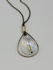 Hope Rising – Crystal Necklace in Brass and Northern Lights
