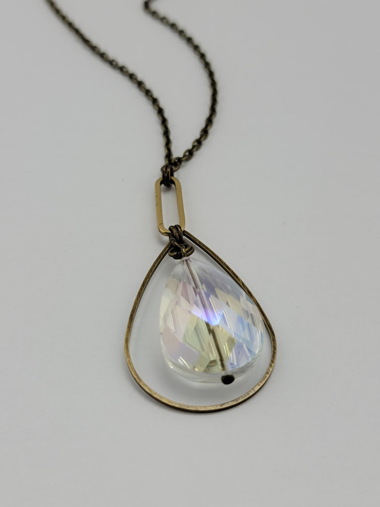 Hope Rising – Crystal Necklace in Brass and Northern Lights