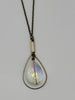 Hope Rising – Crystal Necklace in Brass and Northern Lights