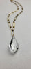 "L' enchantment" Necklace in Clarity + Brass