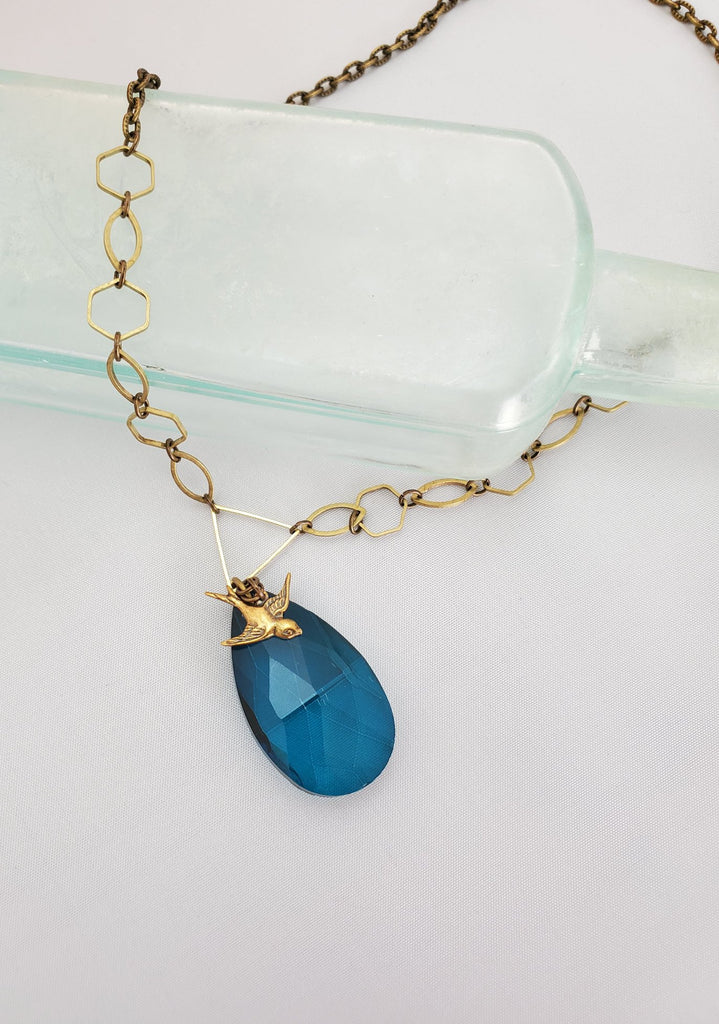 A Little Birdie Told Me So Crystal Necklace in Azure and Brass
